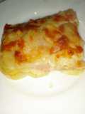 Parmigiana di patate con prosciutto cotto e formaggio