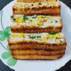 A picture of Spinach Corn Paneer Sandwich.