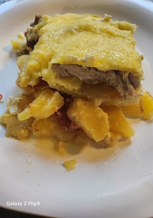 Kacsasütőben krumpliágyon sült tarja recept fotója