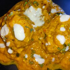 A picture of Buttery Cabbage Kofta Curry.