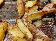 A picture of baked potatoes wedges
