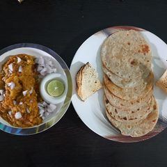 A picture of Bhaji with plain paratha.