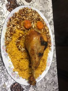 صورة لوصفة فخده ديك رومي مشوي بالرز البرياني والمكسرات