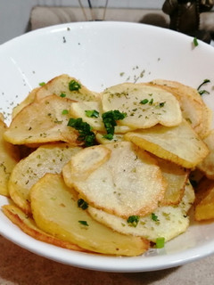 Una foto de Papas fritas tipo americano con orégano