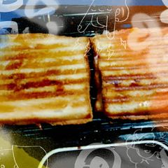 A picture of Cheese corn sandwich.