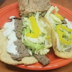 A picture of Gyro Meat W/Tzatziki Sauce.