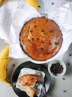 A picture of Eggless Banana Cake with chocolate chips.