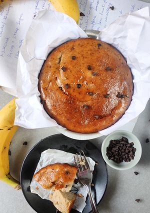 A picture of Eggless Banana Cake with chocolate chips.