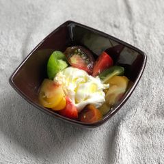 A picture of Tomato Tasting Caprese.
