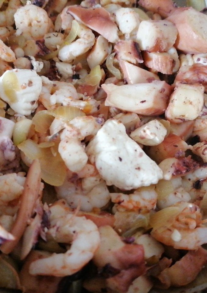 Una foto de Salteado rápido de pulpo y gambas