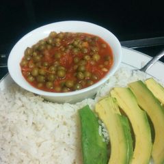 A picture of Peas and white rice.