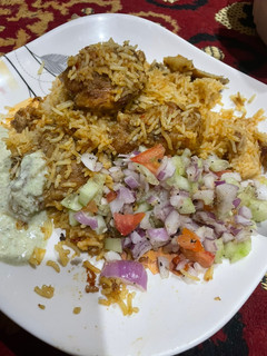 A picture of Tandoori chicken broast biryani.