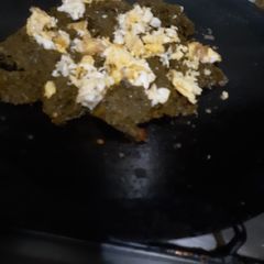 A picture of Saag with egg.