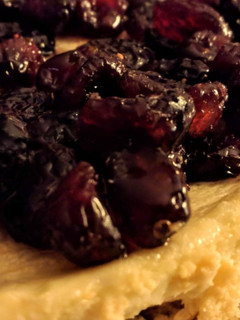 Una foto de Tarta de queso y arándanos