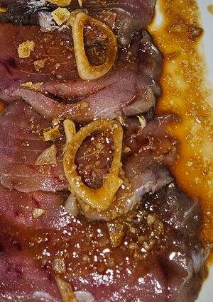 Una foto de Sashimi de atún