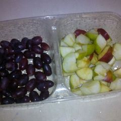 A picture of Green and red apples with berry.