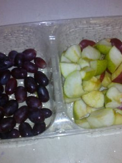A picture of Green and red apples with berry.