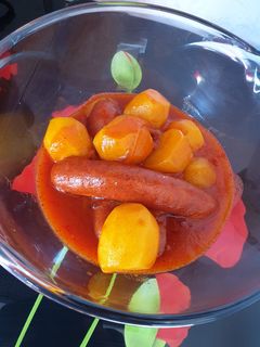 Une photo de Rougail saucisses fumées