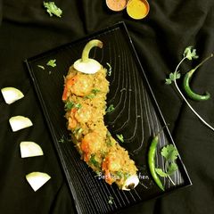 A picture of Lau Chingri Chechki Bottle Gourd Curry with Prawns.
