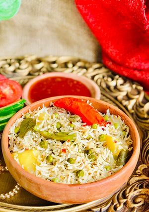 A picture of White vegetable Tahiri / Aloo Matar Tahiri.