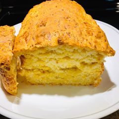 A picture of No Knead Cheesy 🧀Beer 🍺 Bread 🍞.