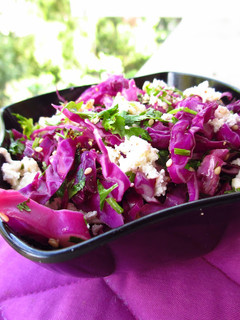A picture of Red Cabbage with Crumbled Cottage Cheese and Toasted Sesame.