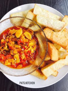 A picture of Onion, Pepper Sauce with Fried Yam.