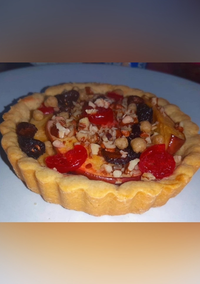 Una foto de Tarta de manzana con nuez y pasas 🍎