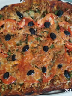 Una foto de Pizza de espinacas