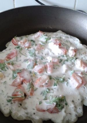 A picture of Rice flour cheela with vegetables.