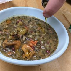 A picture of Persian-inspired herby soup (ghorme sabzi).