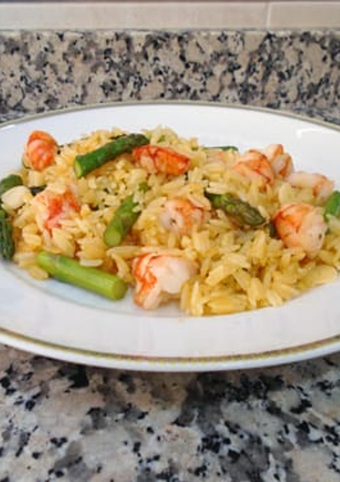 Una foto de Arroz frito dorado o huang jin chao fan