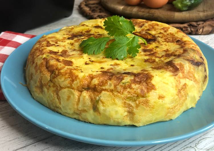 Guía fácil de Cocinar Delicioso Tortilla española de patatas - Receta