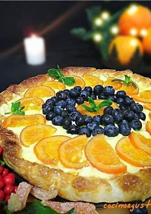 Una foto de Tarta con crema de naranja