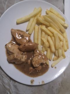 Una foto de Pollo a la cebolla y miel