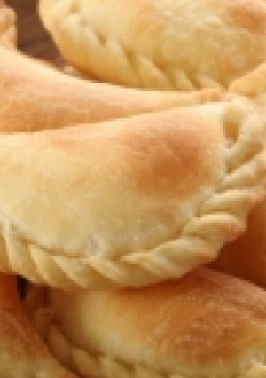 Una foto de Empanadas de pollo y repollo