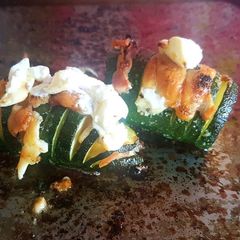 A picture of Keto, low carb bacon and cheese stuffed courgette/zucchini.