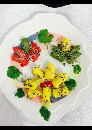 A picture of Colour full khandvi.