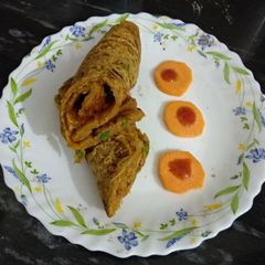 A picture of Whole wheat vegetable roll or cheela.