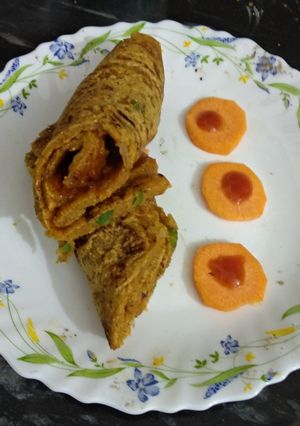 A picture of Whole wheat vegetable roll or cheela.