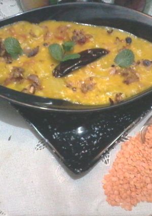 A picture of Masoor Dal and Bottle Gourd with Onion-Tomato Tadka.