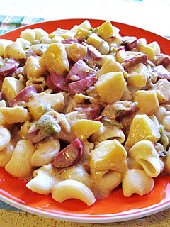Una foto de Conchas con Frankfurty manzana en salsa