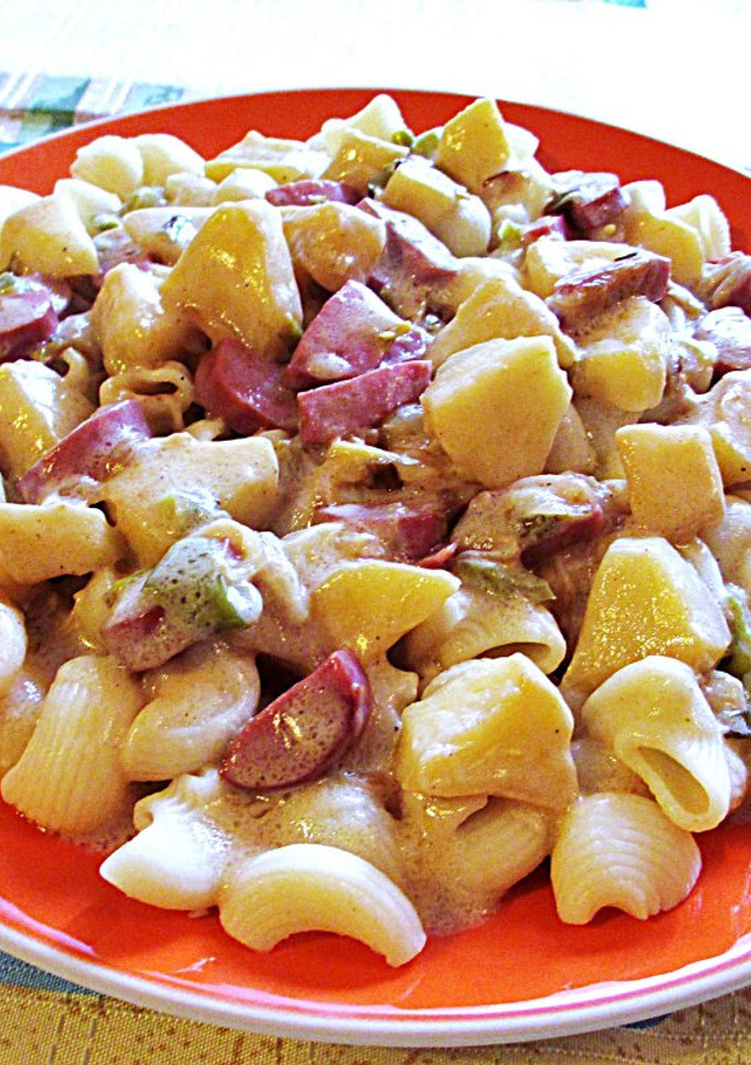 Una foto de Conchas con Frankfurty manzana en salsa