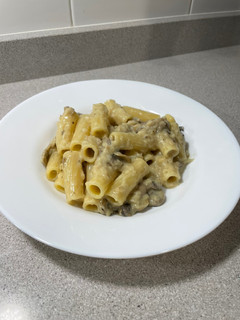 Una foto de Tortiglioni a la crema de champiñones