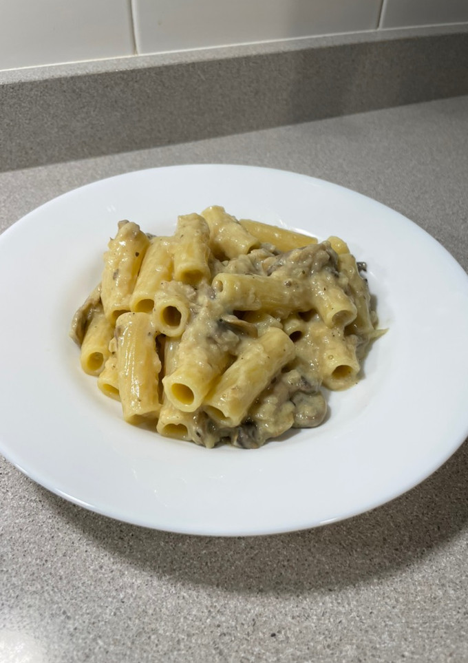 Una foto de Tortiglioni a la crema de champiñones