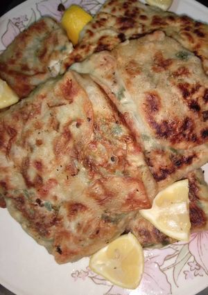 صورة لوصفة مطبق بعجينة البيت على الصاج