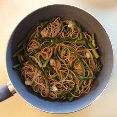 A picture of Asparagus spaghetti with goat cheese.