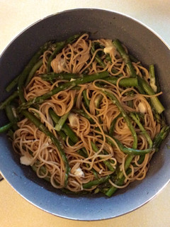 A picture of Asparagus spaghetti with goat cheese.