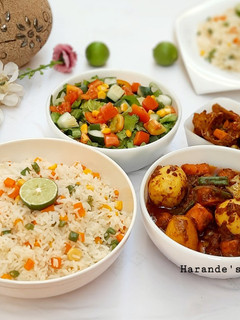 A picture of Lemon veg rice with potato carrot soup.