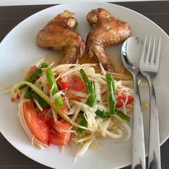 A picture of Papaya Salad & Fried Chicken Wings with Fish Sauce.